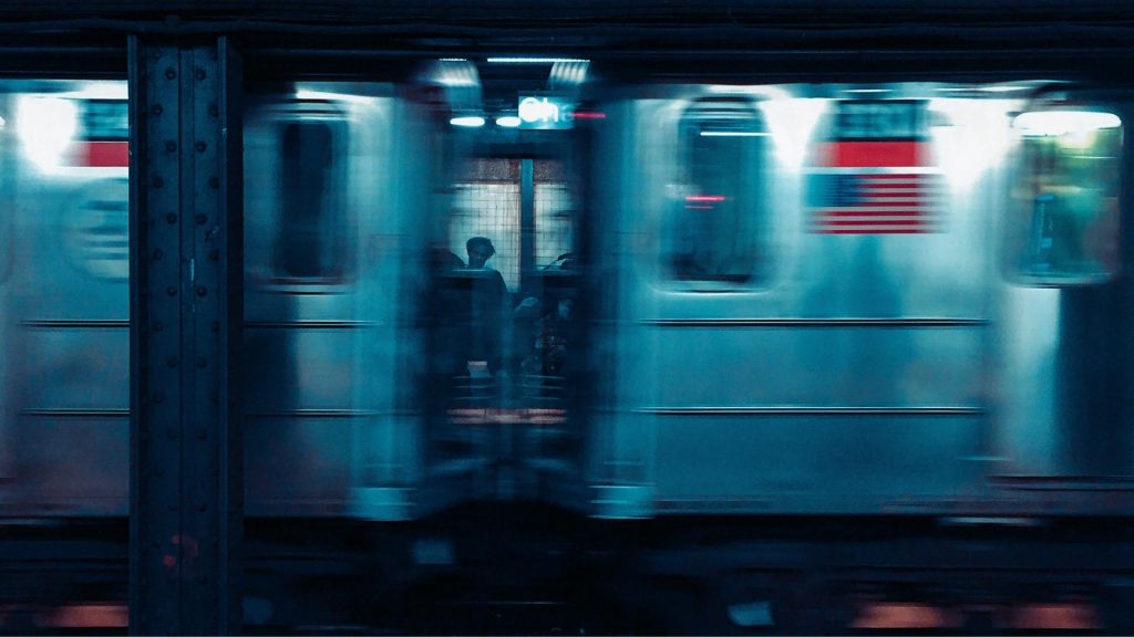 Motion-blurred subway symbolizing the fast-moving nature of the opioid crisis.