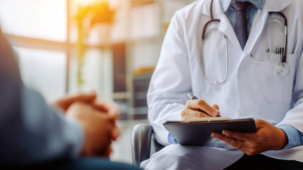 Healthcare provider meeting with a patient to discuss Suboxone treatment covered by Idaho Medicaid
